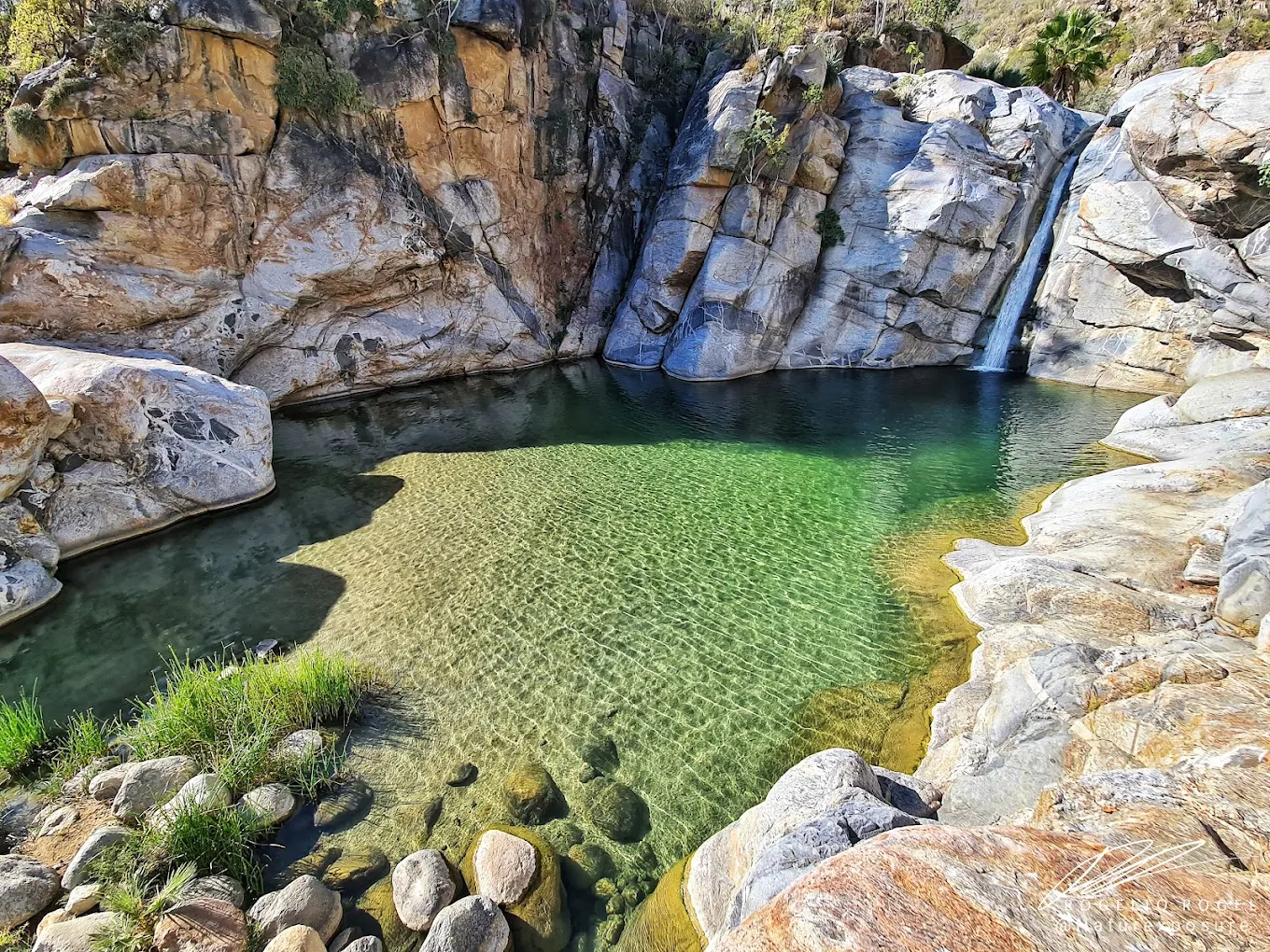 Sol de Mayo waterfall and natural pool in Fox Canyon near Santiago, Baja California Sur